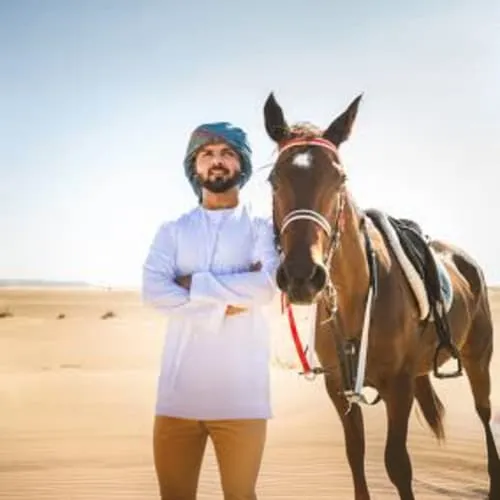 https://d1i3enf1i5tb1f.cloudfront.net/Tour-Images/Final/Horse-Riding-At-Abu-Dhabi-509238/1725963740909_S.jpg