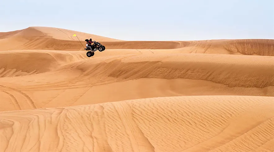 https://d1i3enf1i5tb1f.cloudfront.net/Tour-Images/false-239/quad-biking-abu-dhabi-thrill-image.jpg